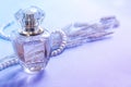 Female perfume in a glass bottle, a gift for a girl