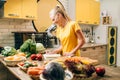 Female person cooking on the kitchen, organic food Royalty Free Stock Photo