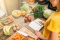 Female person cooking on the kitchen, organic food Royalty Free Stock Photo