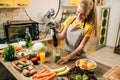 Female person cooking, mixing healthy organic food Royalty Free Stock Photo
