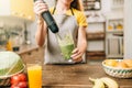 Female person cooking, mixing healthy organic food