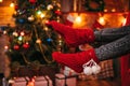 Female person feet in merry red socks, christmas