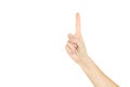 a female person show index finger isolated on a white background. number one or first symbol. idea concept