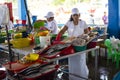 Female Peruvian seller at a fish seafood market