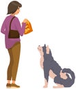 Female pet owner feeding dog with chips. Young lady giving food to domestic animal, cute puppy