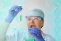 Female pharmacist, scientist holding a glass test tube with medicine, vaccine, modern science innovation concept, medical