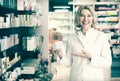 Female pharmacists working in modern farmacy Royalty Free Stock Photo