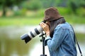 Female photograper shoot photo camera