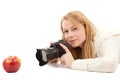 Female photographer with apple Royalty Free Stock Photo