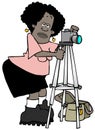 Female photographer with a camera on a tripod