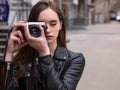 Female photographer. Old school electronics