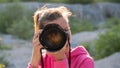 Female photographer taking photo at you Royalty Free Stock Photo