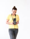 A female photographer using a vintage medium format TLR film camera. Royalty Free Stock Photo