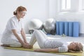 Female physiotherapist working with child Royalty Free Stock Photo