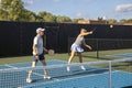 Female Pickleball Player Overhead Slam