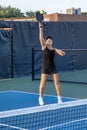 Female Pickleball Player Returning High Lob Royalty Free Stock Photo