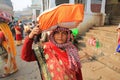 Female Pilgrim Pauses From Her Quest Along the Ganges River in India Royalty Free Stock Photo