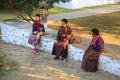 Buddhist Pilgrims Outside Temple, Bhutan