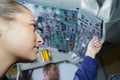 Female pilot engineer in pilot cockpit