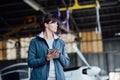 Female pilot using a digital tablet Royalty Free Stock Photo