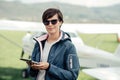 Female pilot using a tablet Royalty Free Stock Photo
