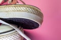 Female Pink canvas vintage styled sneakers basketball shoes, dirty Royalty Free Stock Photo