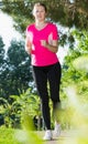 Female in pink T-shirt is training Royalty Free Stock Photo