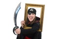 The female pirate with sword and photo frame Royalty Free Stock Photo