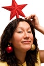 female playing with christmass decorations Royalty Free Stock Photo