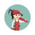 Female plumber standing with giant pipe wrench Royalty Free Stock Photo