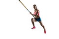 Female pole vaulter training on white studio background