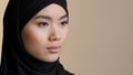 Female portrait islamic woman wear black hijab oriental girl in mourning widow muslim lady in head scarf looking into