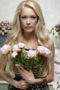 Female posing with bunch of peony Royalty Free Stock Photo