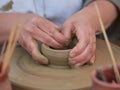 Female potter creating a bowl