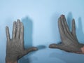 Female potter works with clay, craftsman hands close up, kneads and moistens the clay Royalty Free Stock Photo