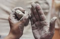 Female potter works with clay, craftsman hands close up Royalty Free Stock Photo