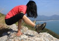 Female practicing yoga on seaside Royalty Free Stock Photo