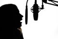 Female presenter of a radio station or news. Singer blogger. Black and white photo Royalty Free Stock Photo