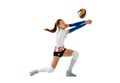 Female professional volleyball player in sports uniform training with ball isolated on white background. Action, sport Royalty Free Stock Photo