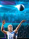 Female professional volleyball players in action on grand court Royalty Free Stock Photo