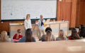 Female professor explaining the lesson to the students