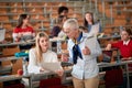 Female professor explaining the score of the exam to a female student