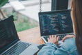 Female programmer working on coding, software development and web design.Concept technology development Royalty Free Stock Photo