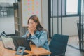 Female programmers are sleepy and exhausted after working and planning to work on programming, software coding and web design.
