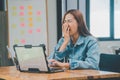 Female programmers are sleepy and exhausted after working and planning to work on programming, software coding and web design.