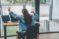 Female programmers are stretching oneself and relaxing after working and planning to work on programming, software coding and web