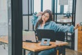 Female programmers are stretching oneself and relaxing after working and planning to work on programming, software coding and web