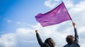 A female protestor on street, her purple flag and raised fist. Generative AI