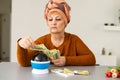 Female psychic or fortune teller gesturing with her hands indicating money