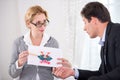 Female psychotherapist holding Rorschach Test Royalty Free Stock Photo